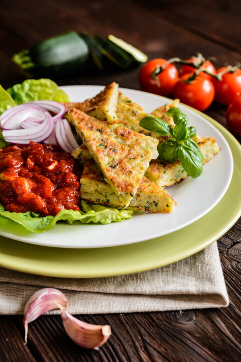 Zucchini Fritters with Puttanesca-Style Red Sauce